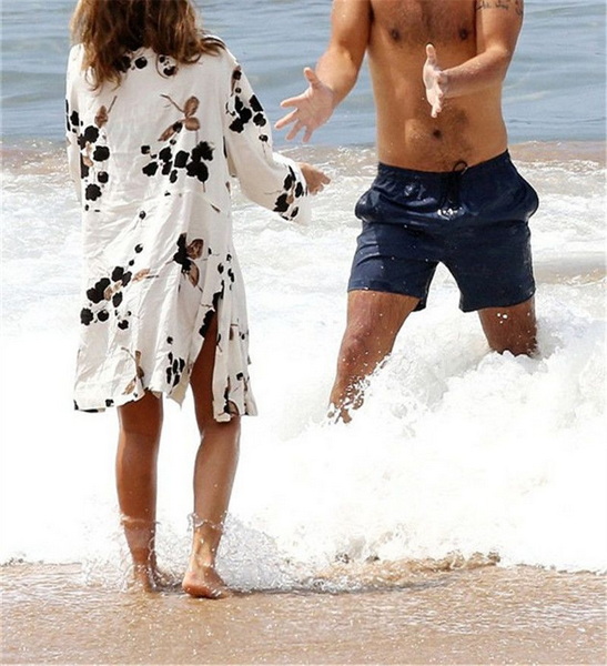 Couple on the beach wear swimwear